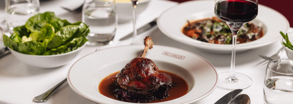 Image of winter mains on set table with white table cloth